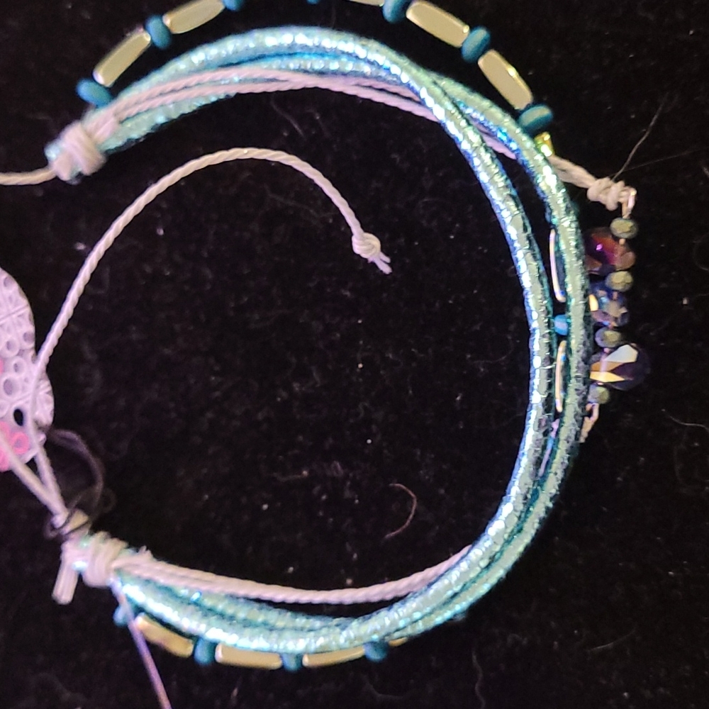 teal multi strand tug and pull bracelet